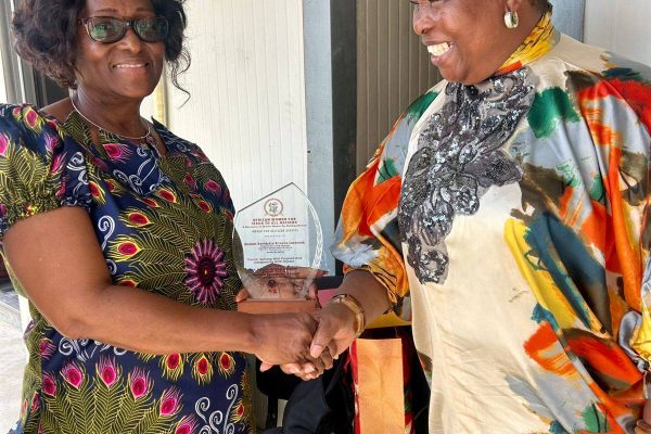 NEC Chairperson Receives Award for Selfless Service