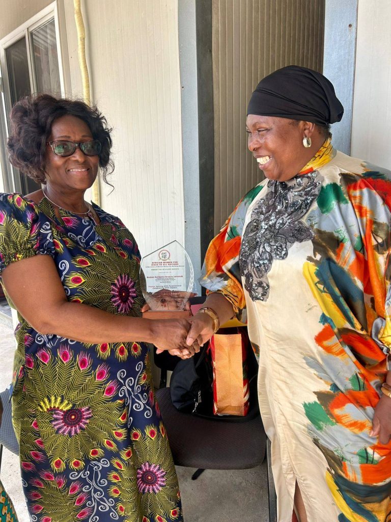 NEC Chairperson Receives Award for Selfless Service